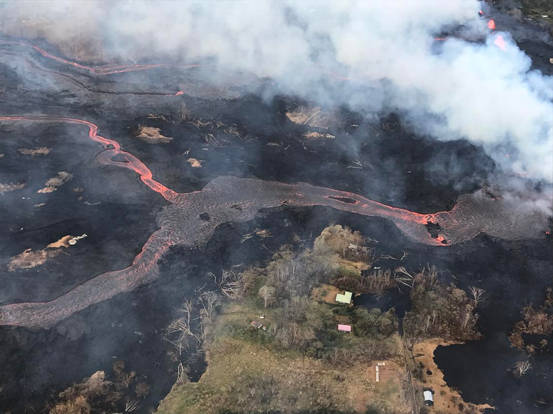 Aerial view of the lower East Rift Zone showing the lava channel merging from Fissure 22 (not visible, but to the center, far right of the image).
